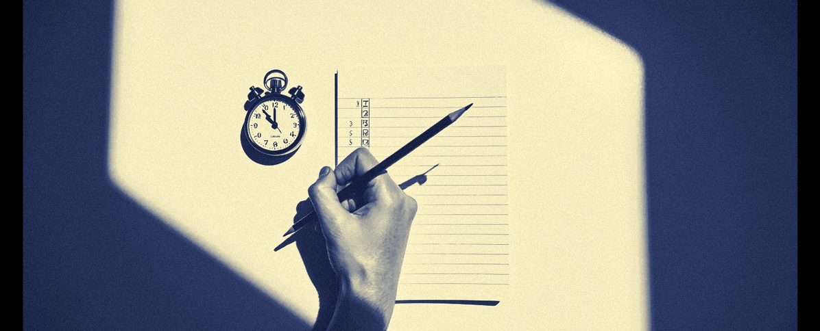 A hand making tally marks on a ruled pad beside a stopwatch.